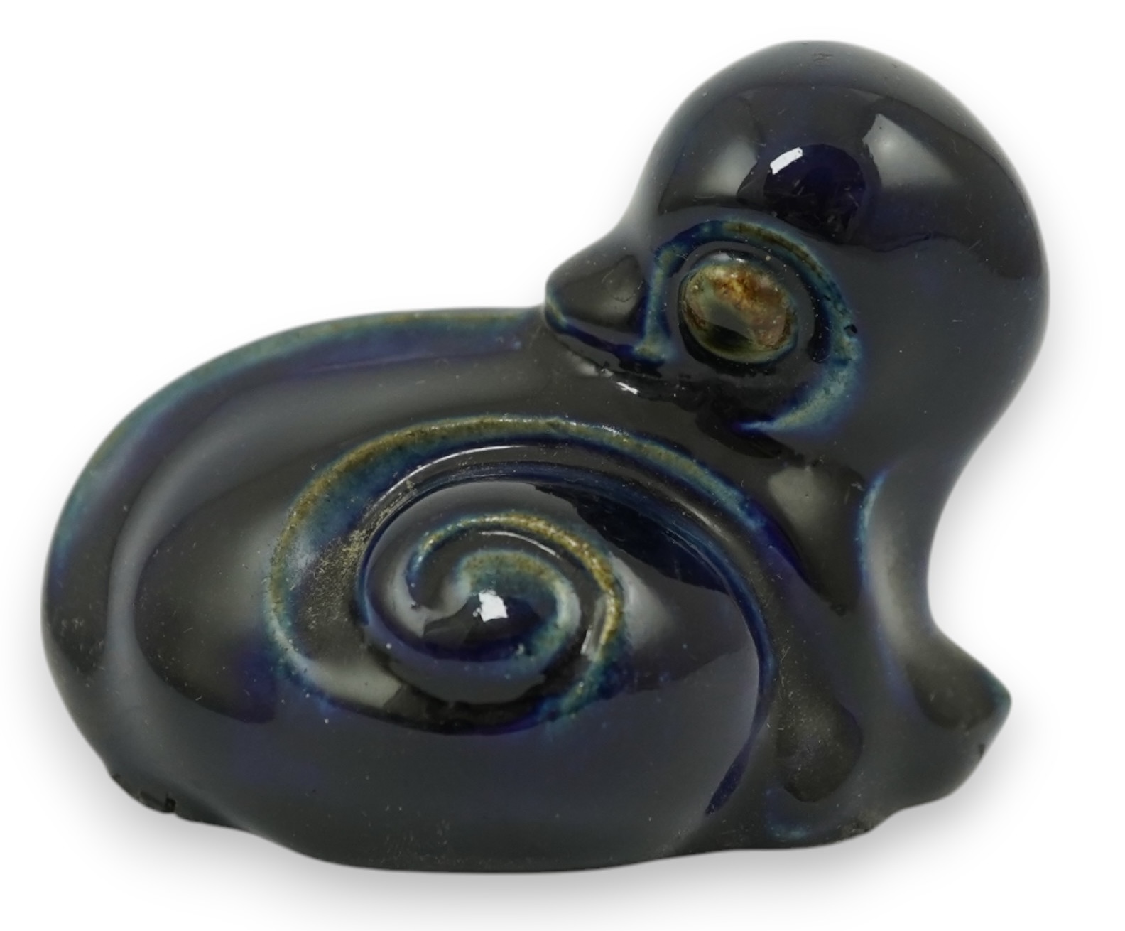 A Royal Doulton stoneware grotesque blue glazed 'duck' by Mark V. Marshall, 9cm wide. Condition - good